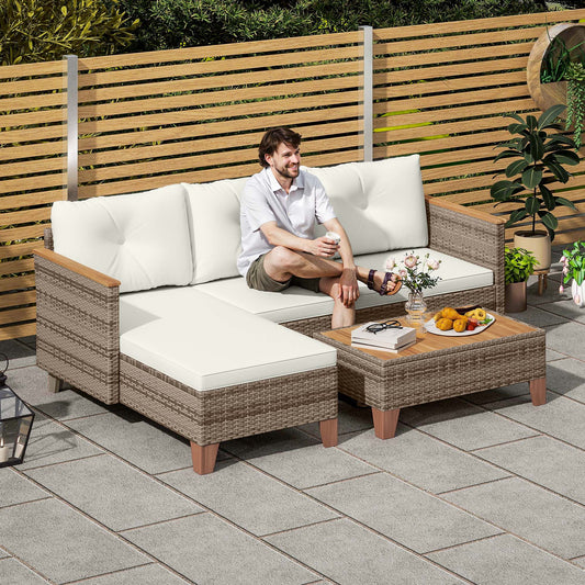 Outsunny 3 Pieces Rattan Garden Furniture Set, L Shaped Garden Conversation Chaise Lounge Furniture with Wood Top Coffee Table and Thick Cushions, Cream